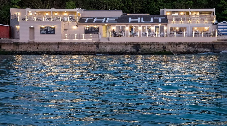 View of the hut colwell bay isle of wight from the solent on a yacht charter