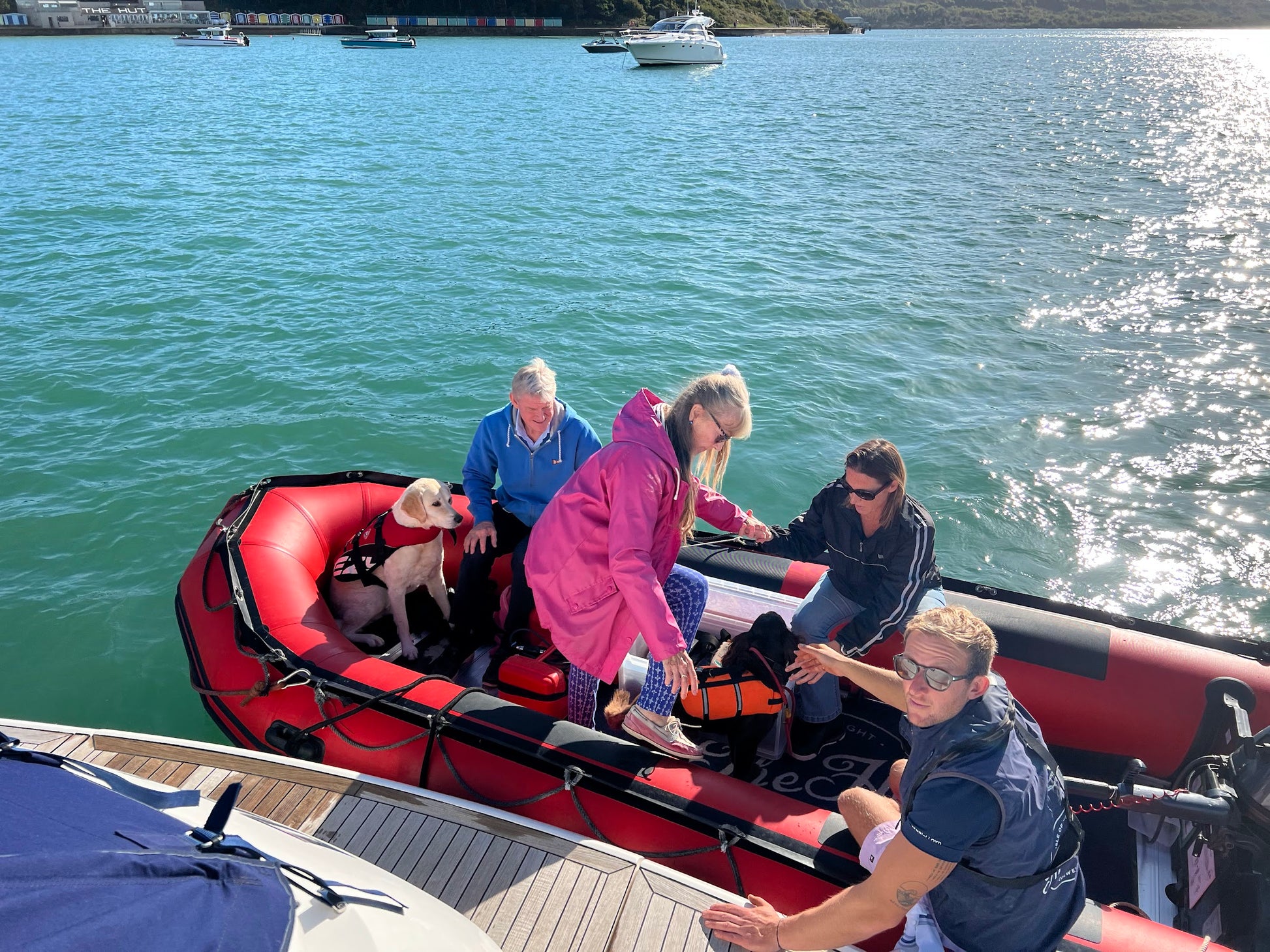 leaving portsmouth yacht charter boat on a tender to the hut colwell bay isle of wight